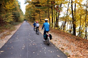 a family bicycle touring during autumn